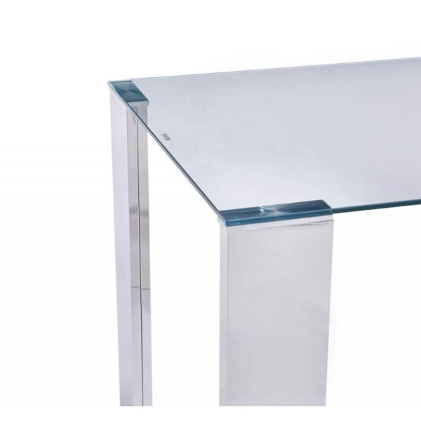 Mesa de comedor rectangular con tapa de cristal templado y pies de acero inoxidable, diseño moderno y elegante.