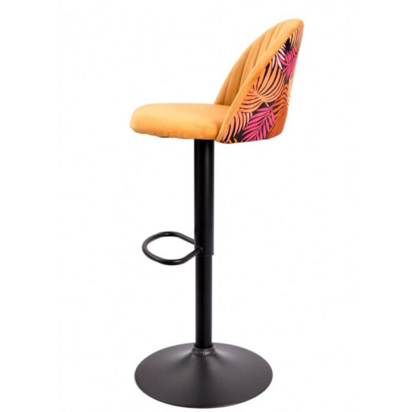 Taburete Flor tapizado en velvet amarillo con diseño floral trasero, base metálica negra y altura regulable para un toque vibrante y moderno.