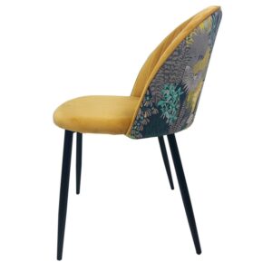 Silla tapizada palm 53 amarillo velvet con estructura metálica negra y respaldo decorado
